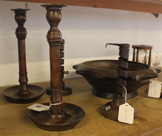 2 18C spiral iron candlesticks, brass candlestick, 2 treen candlesticks & a bowl & a lignum vitae sermon glass